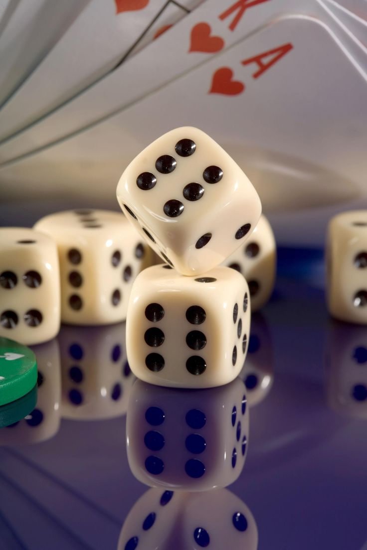 Table selection screen showing betting limits variants and player availability for live dealer games